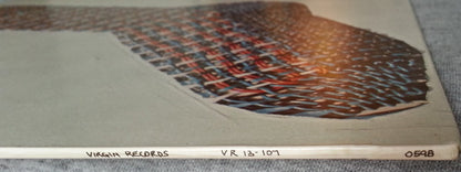 7715980